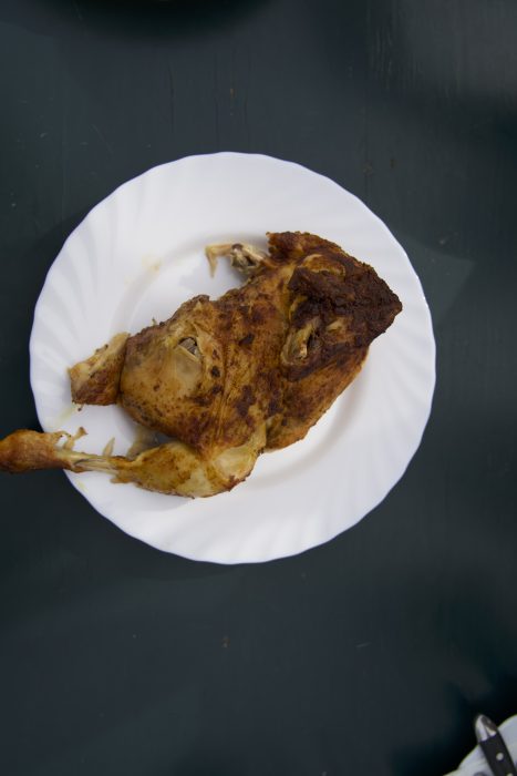 Grilled chicken breast on a white plate 